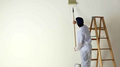 Man-painting-wall-with-roller-e1591923981339 Man-painting-wall-with-roller-e1591923981339